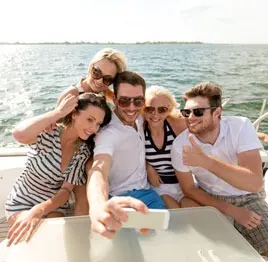 Group of friends enjoying a boat ride